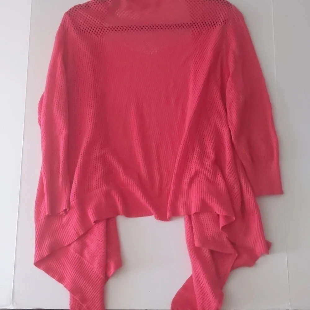 Faded glory asymmetrical hem salmon color sweater. Size large.